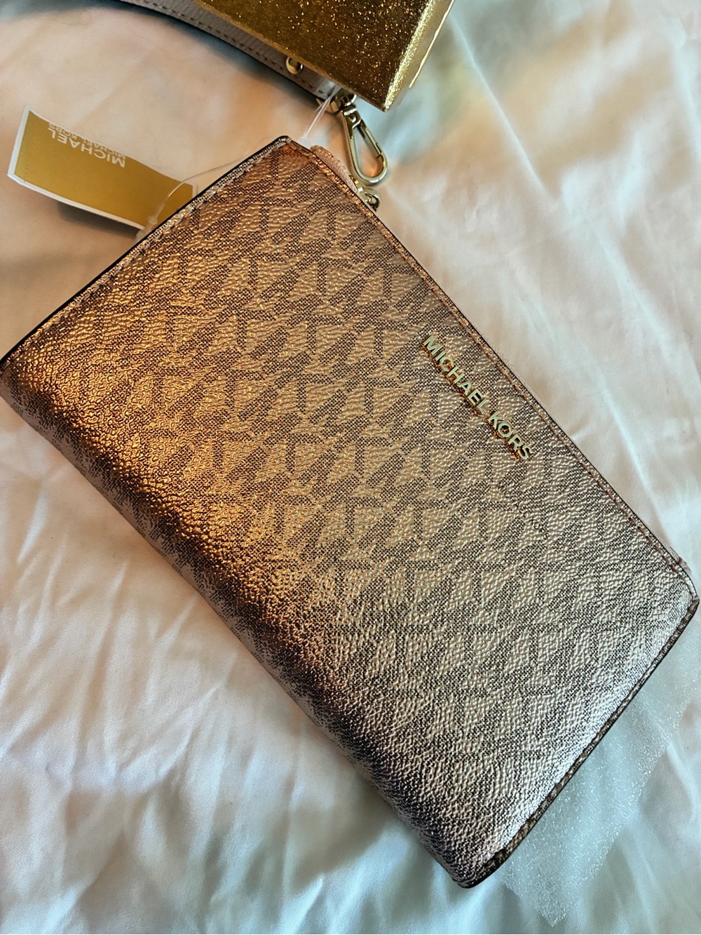 Michael Kors Metallic Rose Gold Signature Wristlet Wallet